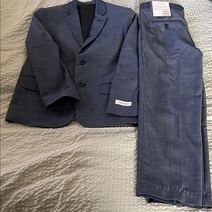 Calvin Klein boys blue Suit size 12R jacket worn once pants NWT.
